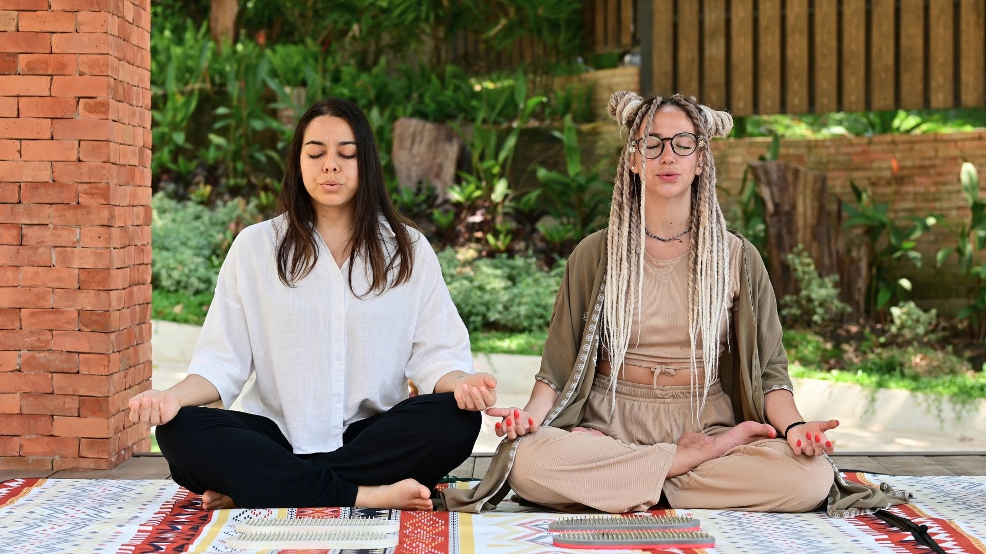 Guests practising a gentle morning flow at Moon Hall Terrace